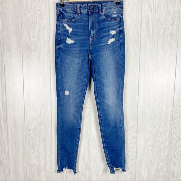 American Eagle Outfitters Denim - American Eagle | Medium Wash Distressed Highest Rise Jegging Size 4